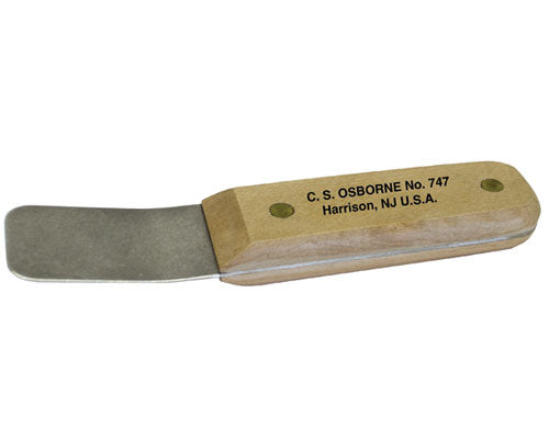 For tucking headlining and upholstery around windows and above doors and other hard to reach places.
A sturdy tough tool with a slightly curved steel blade that has finished edges and rounded corners.
Comfortable hardwood riveted handle.